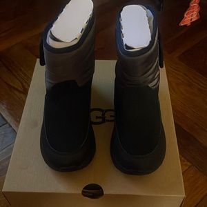 Brand new UGG BOOTS for toddler boys size 13. Black and gray with black suede.